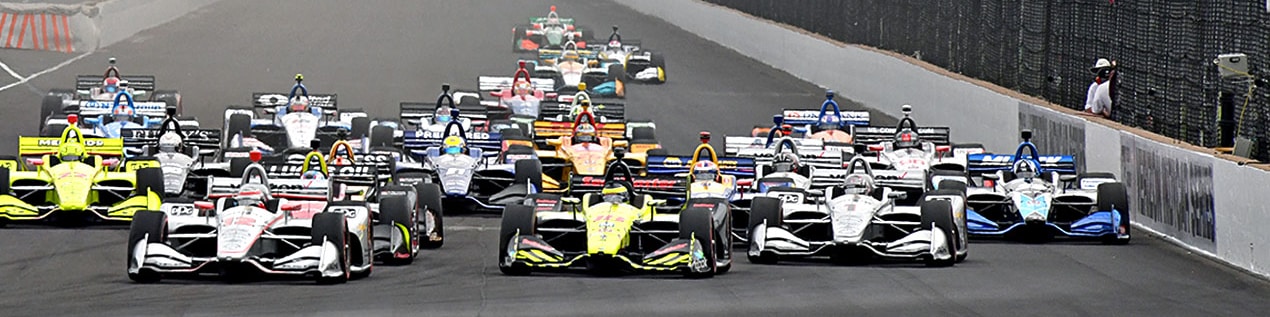 indy cars racing to through the start line Cheyenne